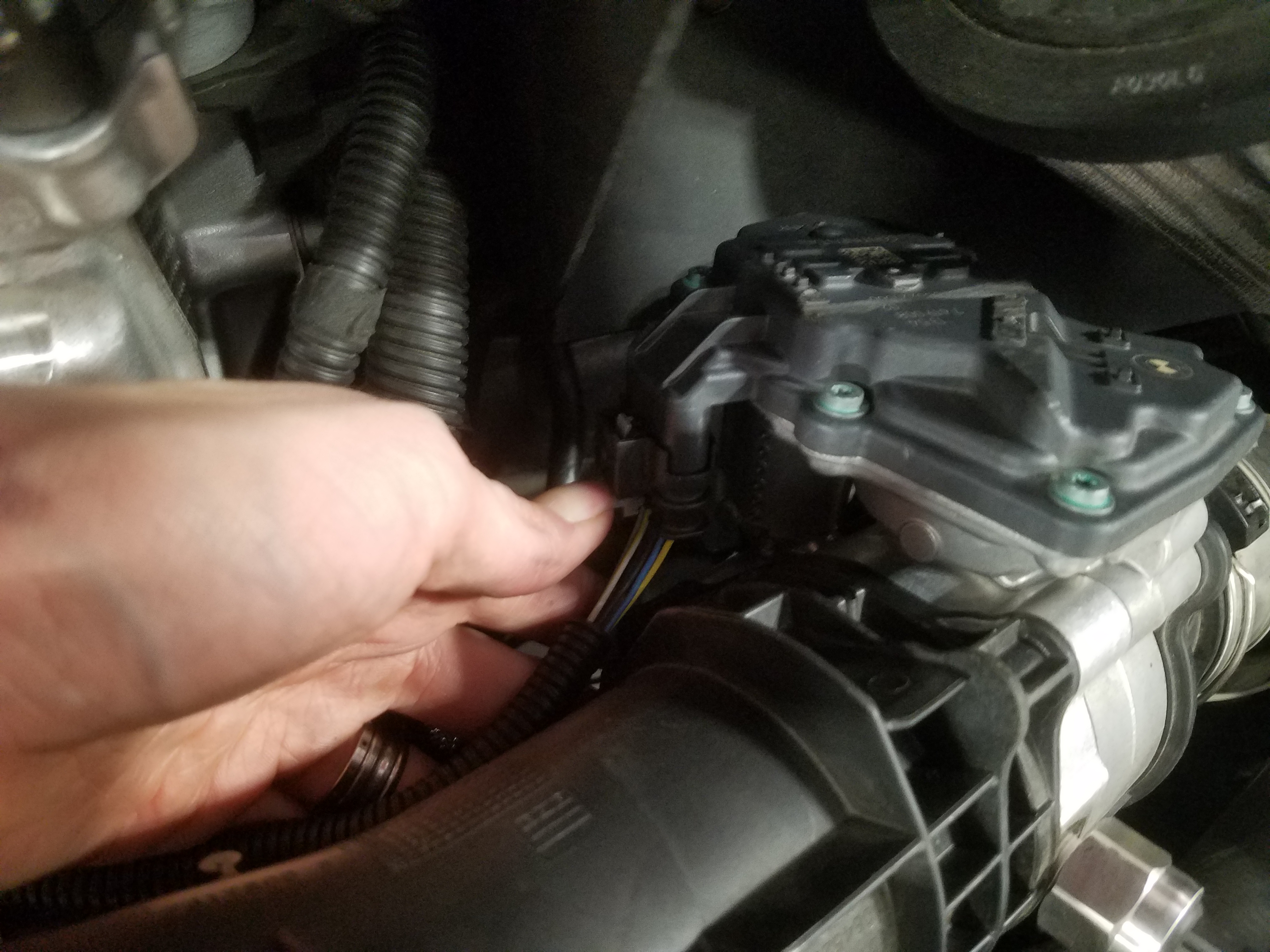 Unplugging throttle body connectors