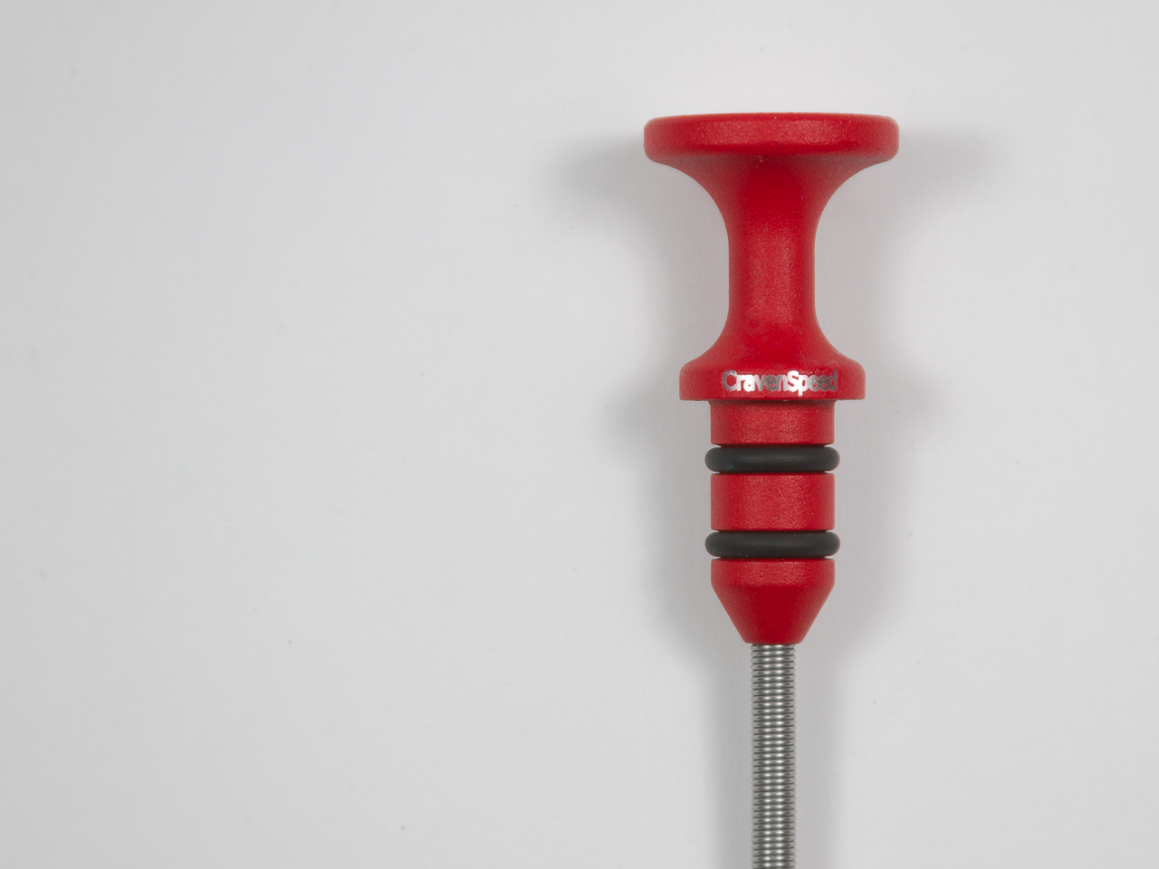 A genuine CravenSpeed dipstick with wrinkle red finish and engraved CravenSpeed logo.