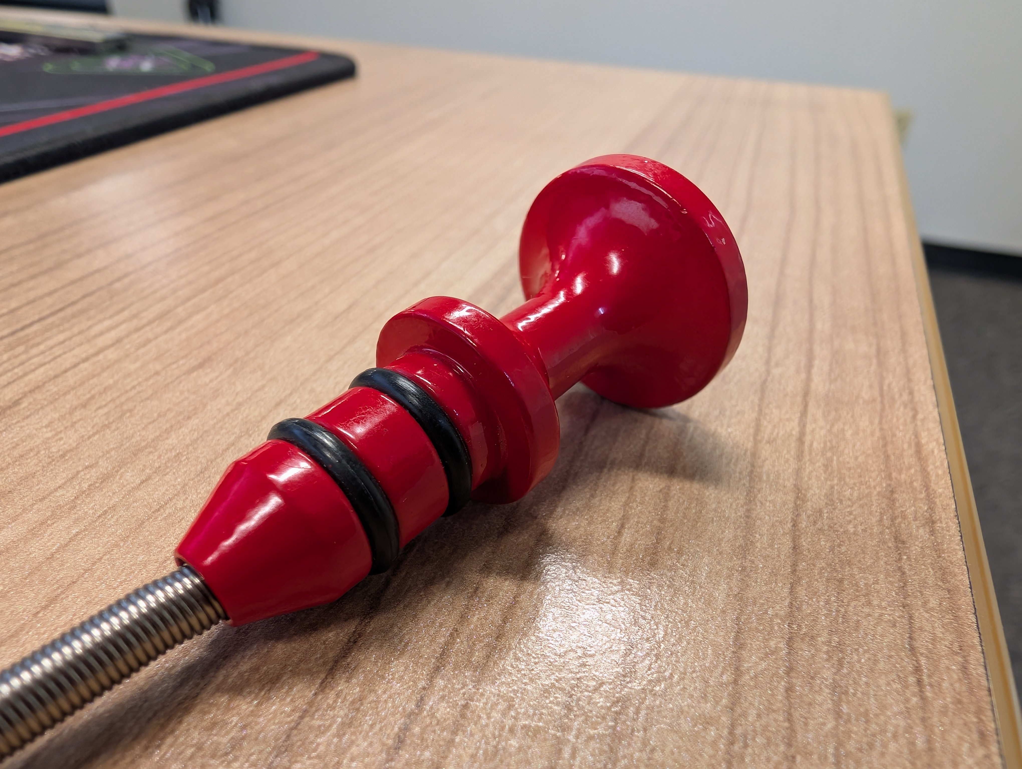 A counterfeit dipstick handle.