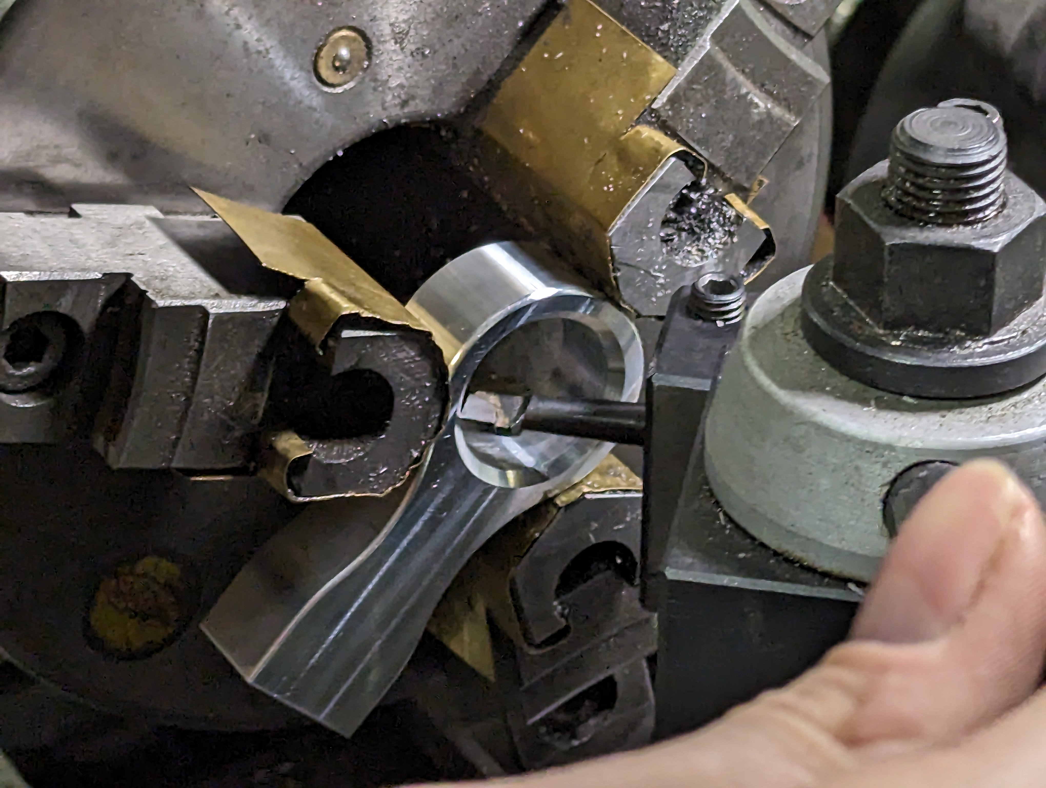 Close-up of the tool setup used to machine the groove in the link half