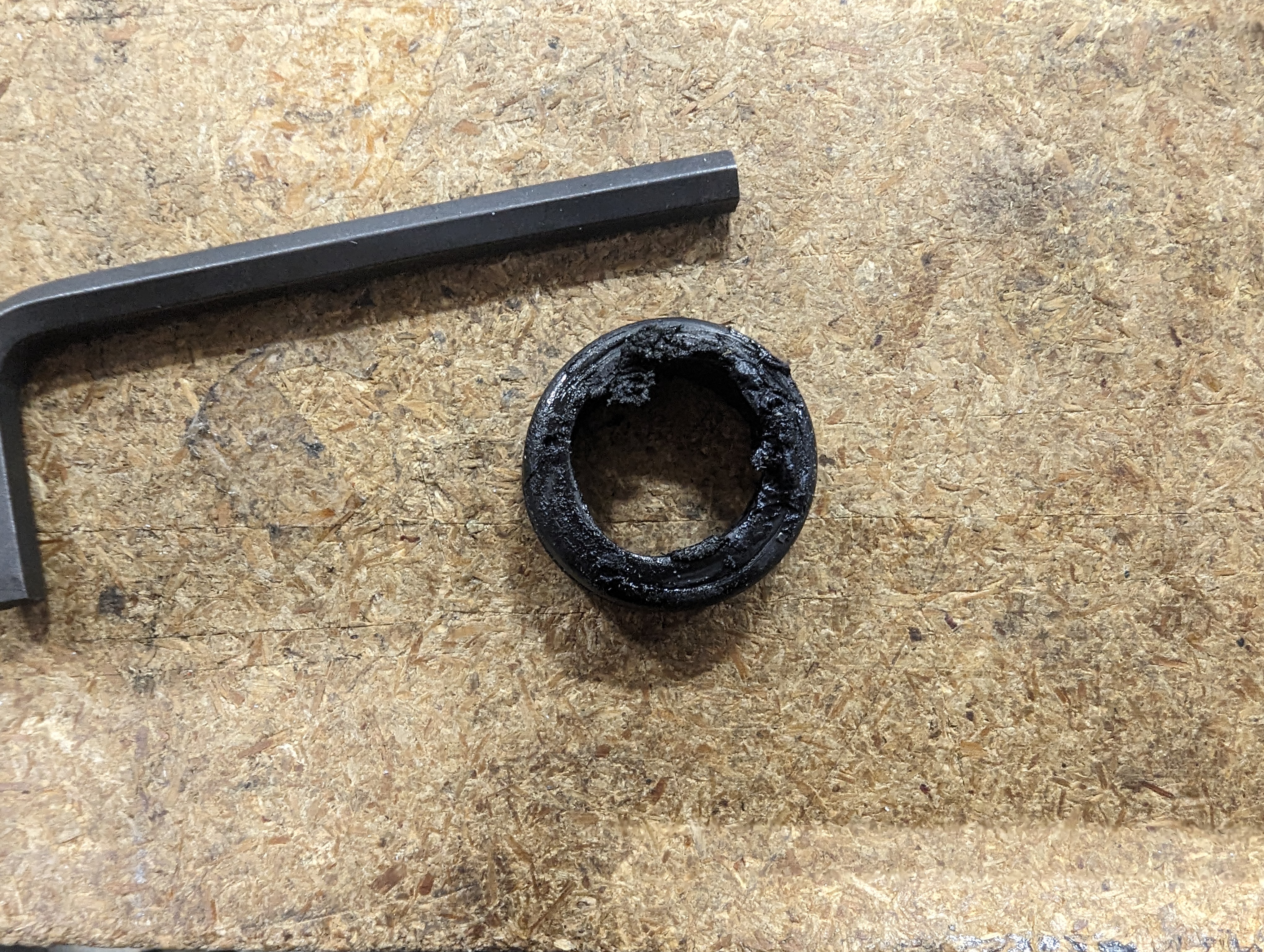 The damaged grommet on the bench